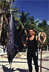 Andreas stands next to his sailfish